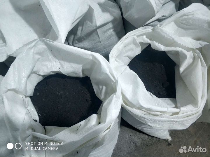 Плодородный слой чернозем в мешках