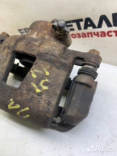 Суппорт тормозной передний левый Chevrolet Lacetti