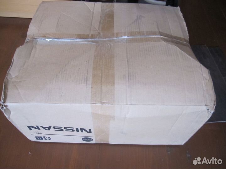 Фара левая Nissan Almera N16E оригинал новая