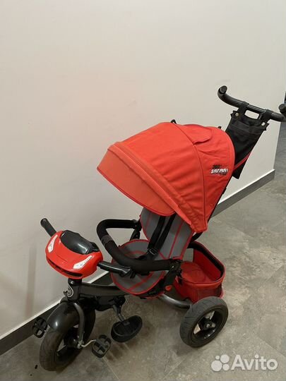 Трехколесный велосипед с ручкой