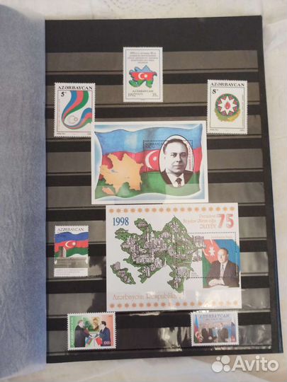 Большой и маленький альбом с марками