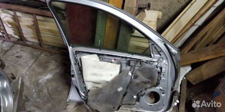 Двери левая сторона almera n16