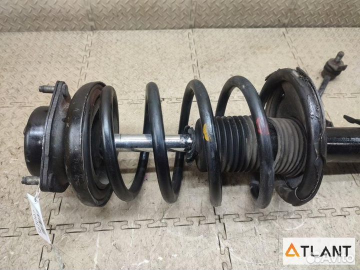 Стойка передняя левая nissan elgrand