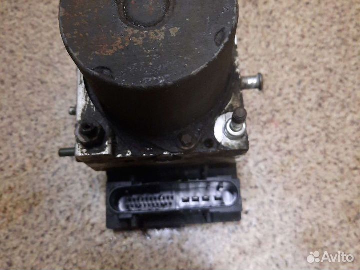 Блок ABS (насос) Nissan Primera P12E 2002-2007