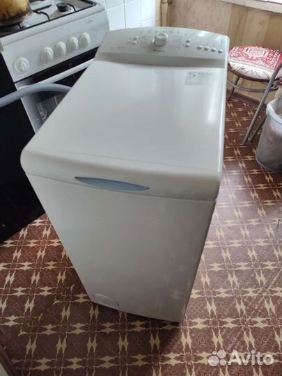 Стиральная машина с вертикальной загрузкой