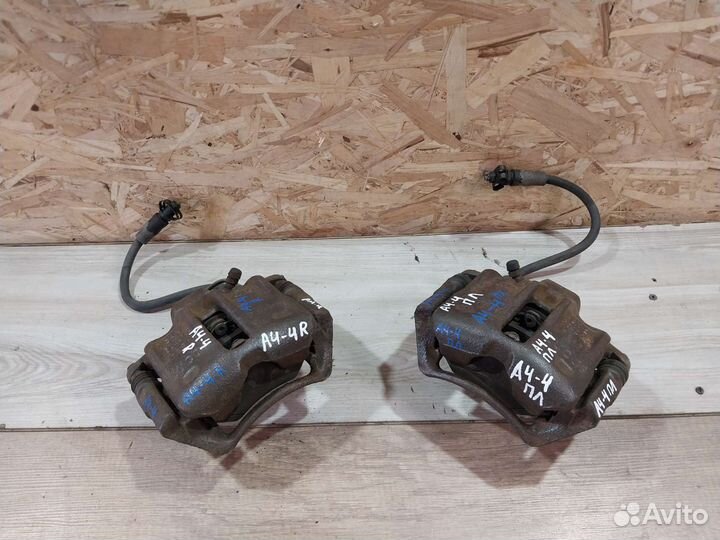 Суппорт передний Volkswagen Passat B5