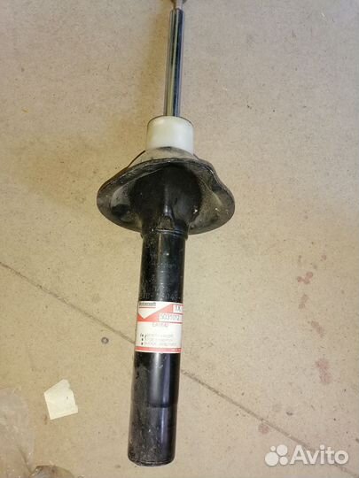 Стойка передняя левая ford Escort 7 оригинал