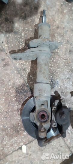 Стойка подвески передняя левая Заз Сенс