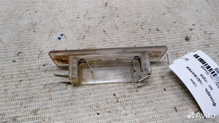 Фонарь подсветки номера BMW