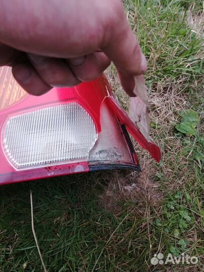 Фонарь задний логан