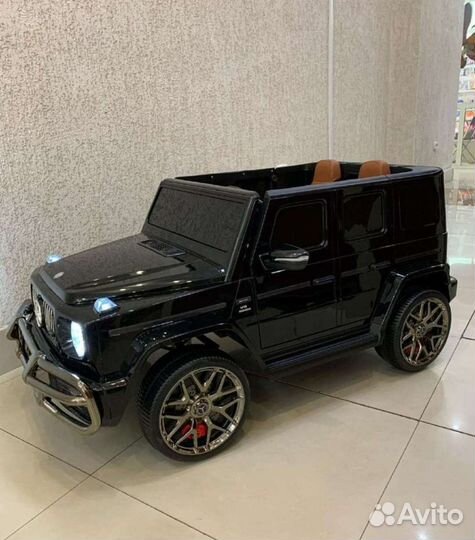 Детский электромобиль двухместный