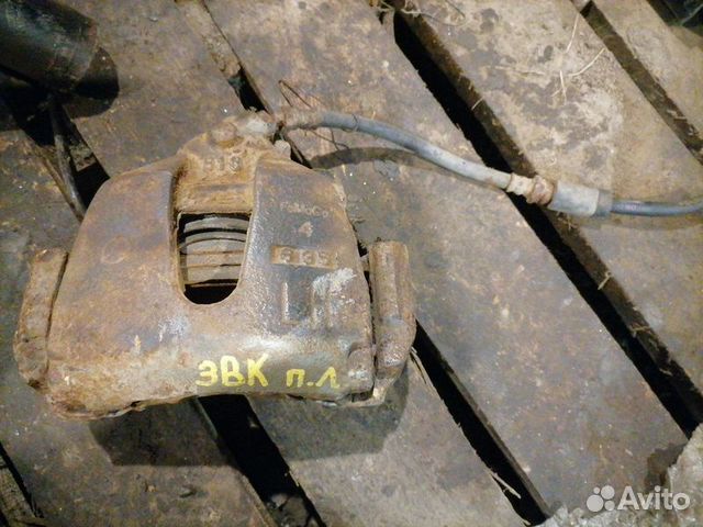 Суппорт тормозной передний правый Mazda 3