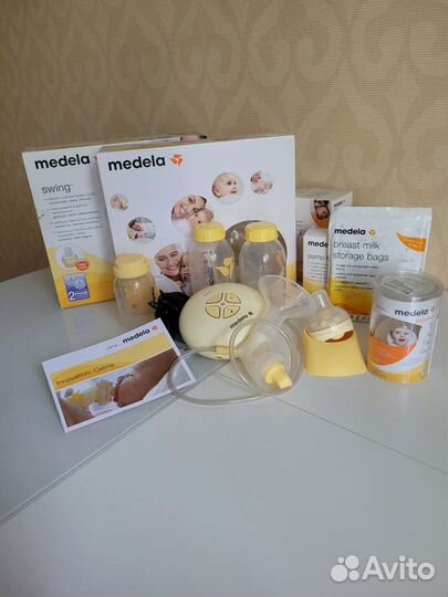 Молокоотсос Medela электрический новая соска Calma