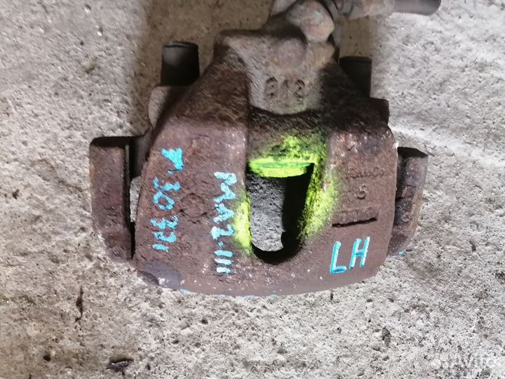 Суппорт тормозной передний левый Mazda 3 BK