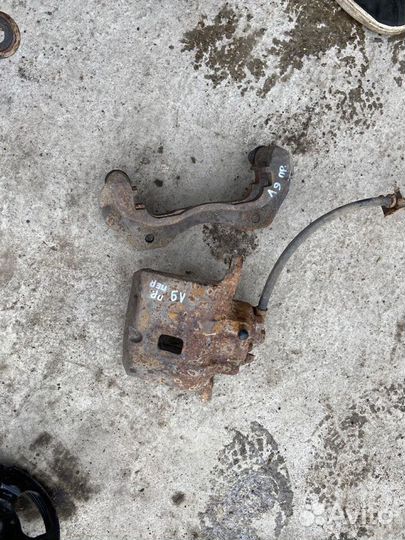 Суппорт передний митсубиси лансер 9 1.6