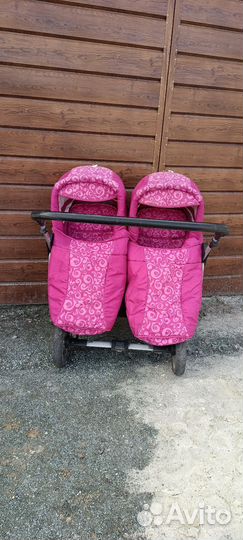 Двойная детская коляска