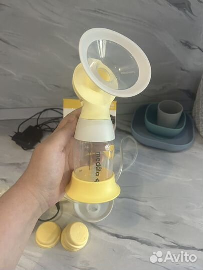 Молокоотсос medela swing электрический