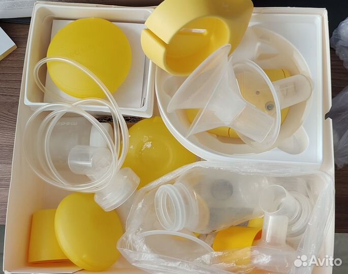 Молокоотсос medela мини электрический