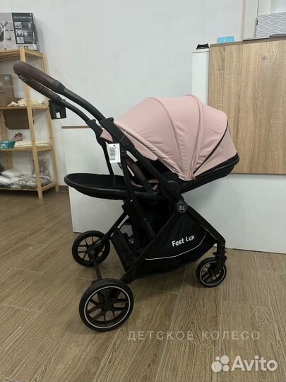 Коляска с перекидной ручкой, реверсивный блок