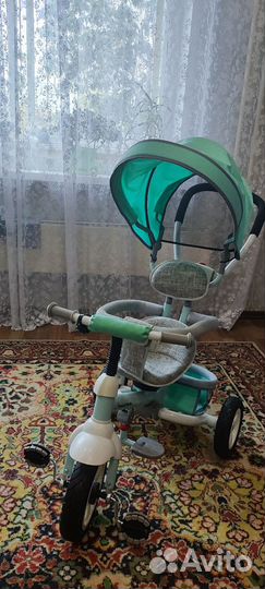 Трехколесный велосипед с ручкой