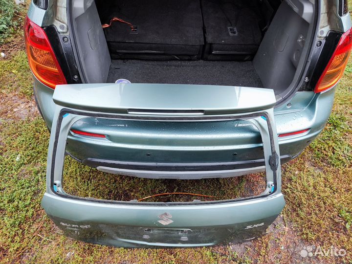 Дверь хлопушка Сузуки сх4 оригинал