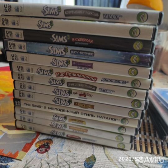 Cd диски 13 шт Sims 3 приложения и проч