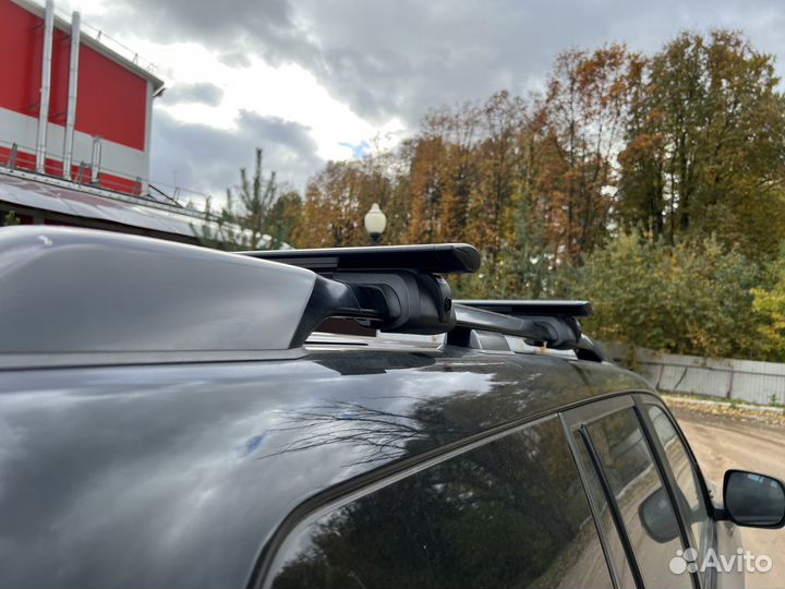 Багажник titan на рейлинги с крыловидными дугами