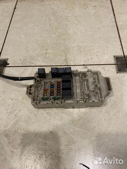 Блок предохронителей в салоне Mitsubishi Lancer 9