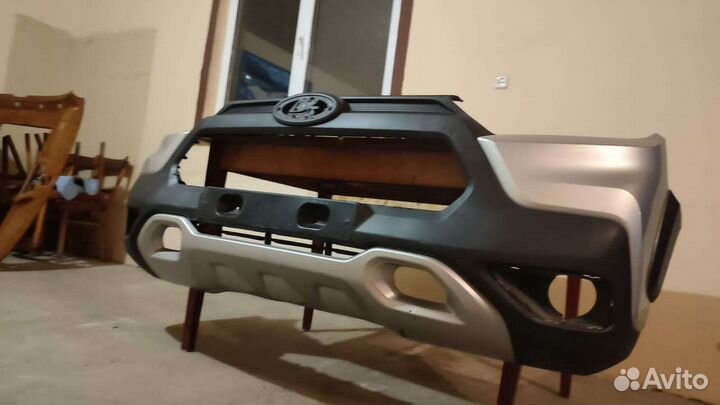 Передний бампер на ниву тревал