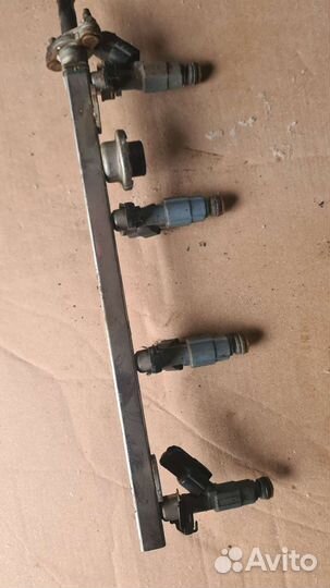 Форсунка топливная kia Sorento 2 xm 2.4 G4KE