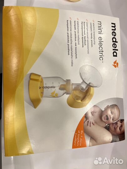 Молокоотсос medela электрический