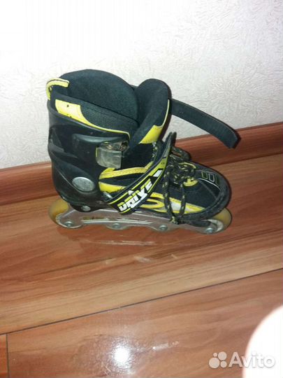 Роликовые коньки