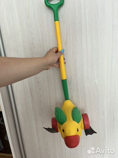 Игрушка каталка с ручкой