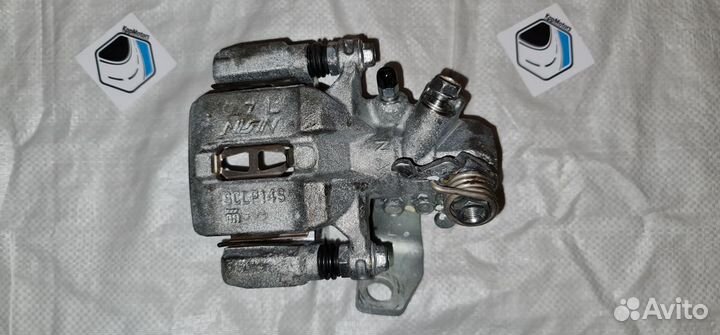 Суппорт тормозной задний левый Honda Civic 4D