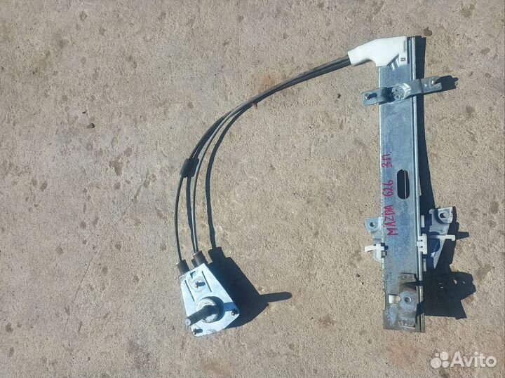 Стеклоподъемник задний правый Mazda 626 ge