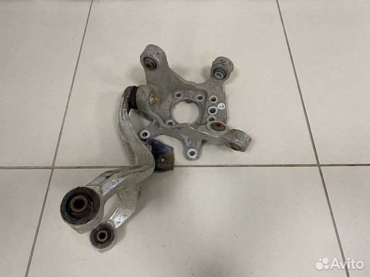 Б/У Кулак поворотный задний левый 43019JN00A