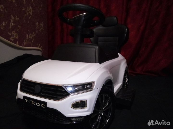 Машинка каталка толокар