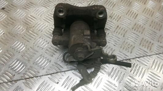 Суппорт тормозной задний левый skoda octavia A5 (1