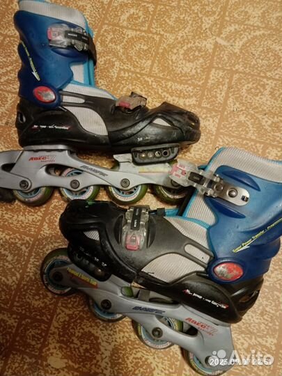 Роликовые коньки