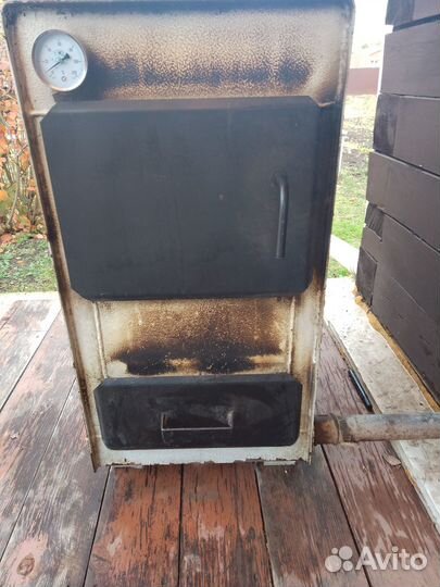 Твердотопливный котел бу Каракан