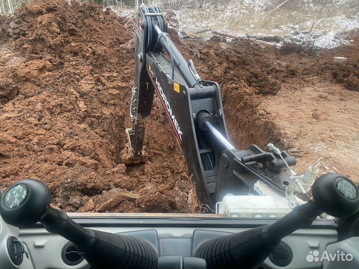 Экскаватор погрузчик