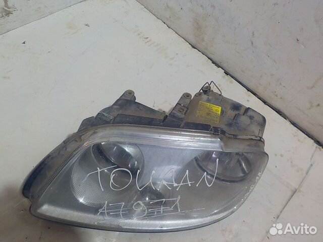 Фара левая Volkswagen touran
