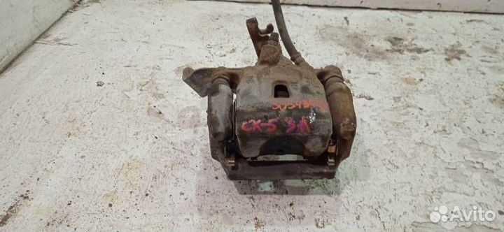 Суппорт задний левый