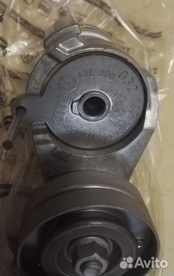 Натяжитель ручейкового ремня с роликом skoda