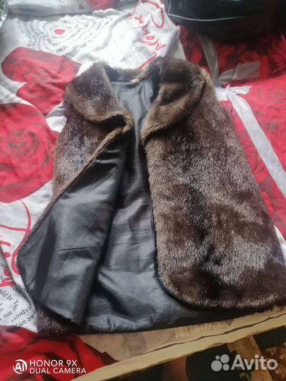 Жилетка меховая женская
