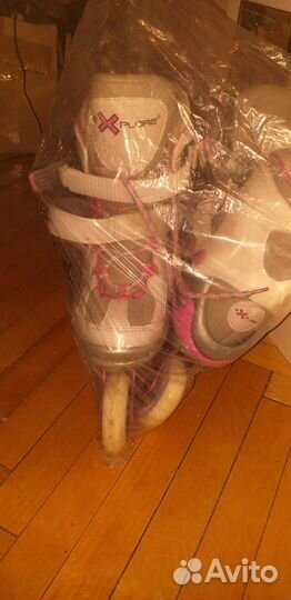 Роликовые коньки