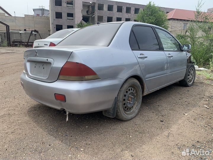 В разборе Mitsubishi Lancer 9 АКПП