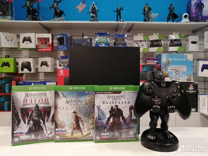 Xbox One X + игры из серии Assassins Creed