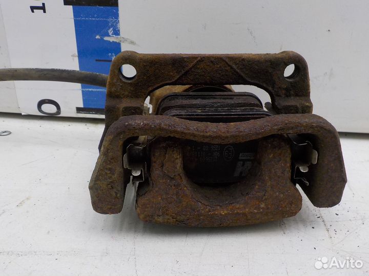 Суппорт тормозной задний правый Land Rover Freelan