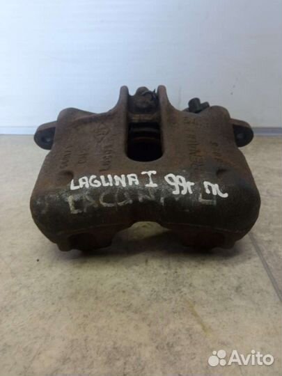 Суппорт тормозной передний левый Renault Laguna 1
